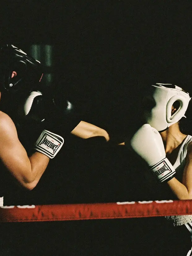 Two boxers sparring in a ring