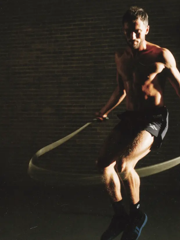 A man skipping in the gym
