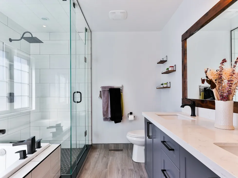 A finished bathroom with a walk-in shower.
