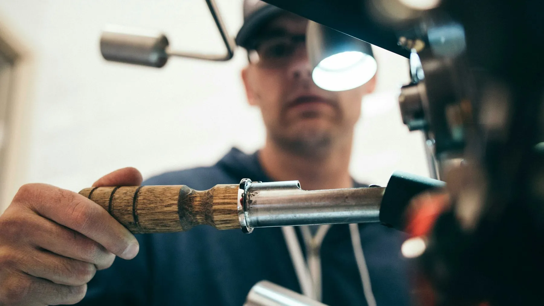 An engineer soldering copper pipework.